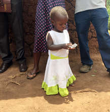Little girl eating Ekitobeero and getting healthy!