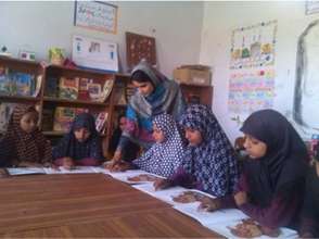 Riaz teaching at a school she once attended