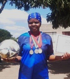 Sophia and her soccer awards!