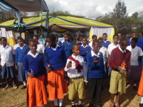 Gongali students turning OFF Kerosene Lamps