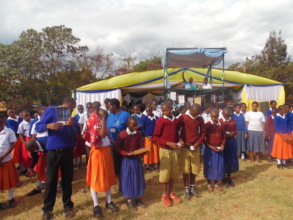 Gongali students turning ON the Solar Lanterns