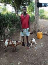 AGEDEK Beneficiary with his Female Goat and Kid