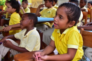 Children watch attentively....