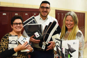 Gabriel delivers tech gifts to his alma mater.