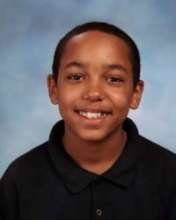 Henry in 4th Grade at Christel House
