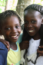 Youslie (left) and her friend Wichide at school