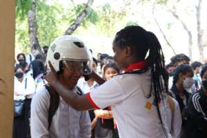 Students receiving quality helmet