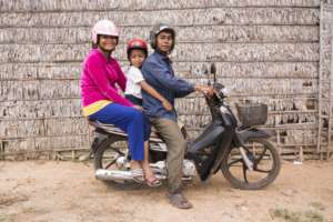 Chantheavin (center) and her parents.