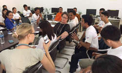 A student speaks with the Australian ambassador.