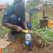 A Water Engineer connecting the Bulk Smart Meter