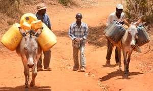 Water Vendors deliver water to the community