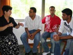A Nun and young adults in conversation