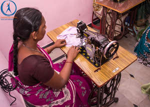deprived woman learning tailoring embroidery
