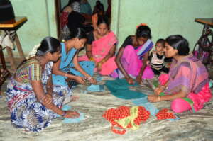empowerment_of_poor_women_learning_tailoring