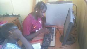 Young women using computers 2