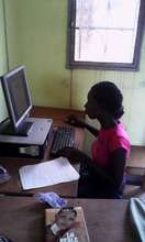 Clara using computer in Hounde