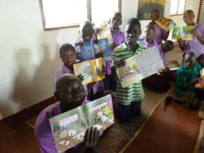 Children with books in Sumbrungu library, Ghana