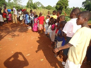 Children lining up for a nutritious meal