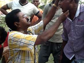 Dr. Sajith treating a patient at our mobile clinic