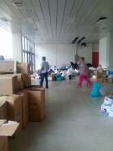 sorting out the goods we bring for families