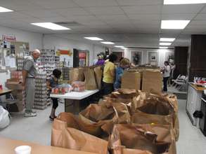Preparing relief food - packages for kids