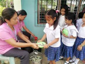 Students in line for AAI sponsored midday meal