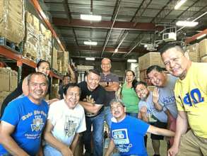 Happy volunteers pack donations in Virginia