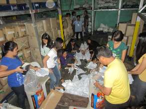 Cebu volunteers packing for AAI-IPI Ormoc mission