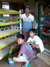 students help build library shelves, Maindang Elem