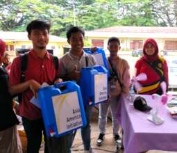 AAI provides 5gal waterjugs to families