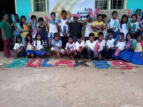 Providing rubber sandals to every school child