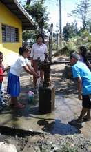 Children wash hands before lunch at Maindang Elem