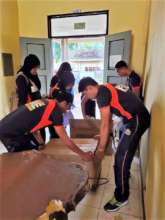 Firefighters and schools help to sort donations