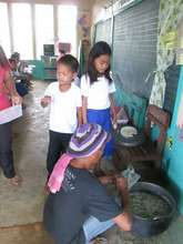 Dads help serve school lunch too!