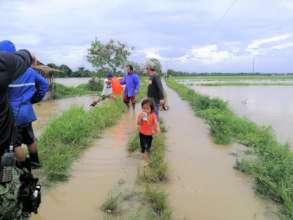 Villagers asses damage after Typhoon Goni
