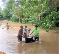 A tub serves as a flotation device for young girl