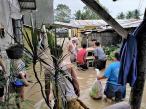 Families try to salvage belongings