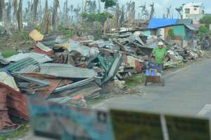 Flattened town in Leyte assisted by AAI-OWI-IPI