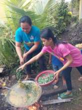 a 6th grade pupil helps Mom prepare school lunch