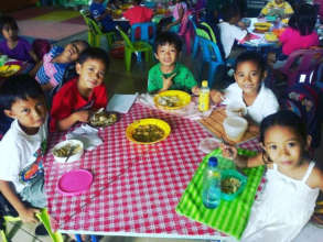 A happy meal at Angub Elementary School