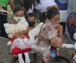 Children are so happy to receive a stuffed animal