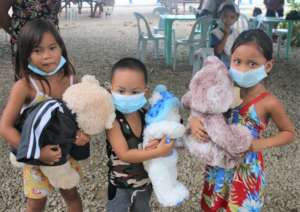 Children sharing their new toys