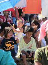 children who lost their homes in Batad seek food