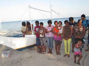 Baliguian fisher folk thank God for life and boats