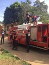 Fire fighters in Jolo help to rebuild schools