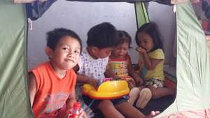 Children in "hobbit tents" at Bulak, Elmentary,