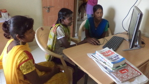 Tribal girls touching mouse for the first time