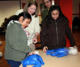 Kenia and her peers learning CPR.