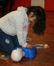Learning CPR steps.
