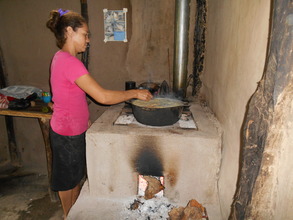 Nubia L. cooking on her Joco Justa Stove